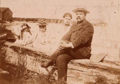 Lighthouse Keeper William Holmes on the right
